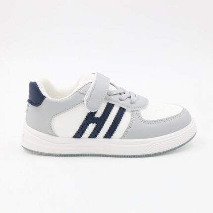 بوت سبورت ولادي بشريط لاصق لون سكني وكحلي ونعل ابيض