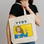 حقيبة قماش طباعة جرافيك أصفر حجم 35×33 سم لون ابيض