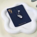 حلق سرة مع حجر زركون دائري لون فضي من FJ مقاوم لتغير اللون كفالة سنتين ضد تغير اللون