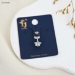 حلق سرة مع حجر زركون شكل نجمة لون فضي من FJ مقاوم لتغير اللون كفالة سنتين ضد تغير اللون