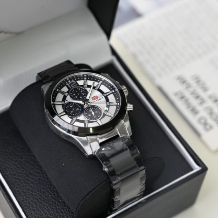 103386947_688a0c71f0e40 ساعة رجالي FOCUS MINI مع اطار مميز لون فضي و أسود - الصورة 1