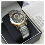 ساعة رجالي EXTRI مع اطار بالثواني لون فضي و ذهبي