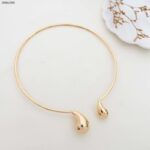 سوار ناعمة بنجل لوزتين لون ذهبي واصفر كفالة سنتين ضد تغير اللون