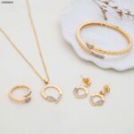 طقم ذهبي دائري مع زركون لون ذهبي كفالة سنتين ضد تغير اللون