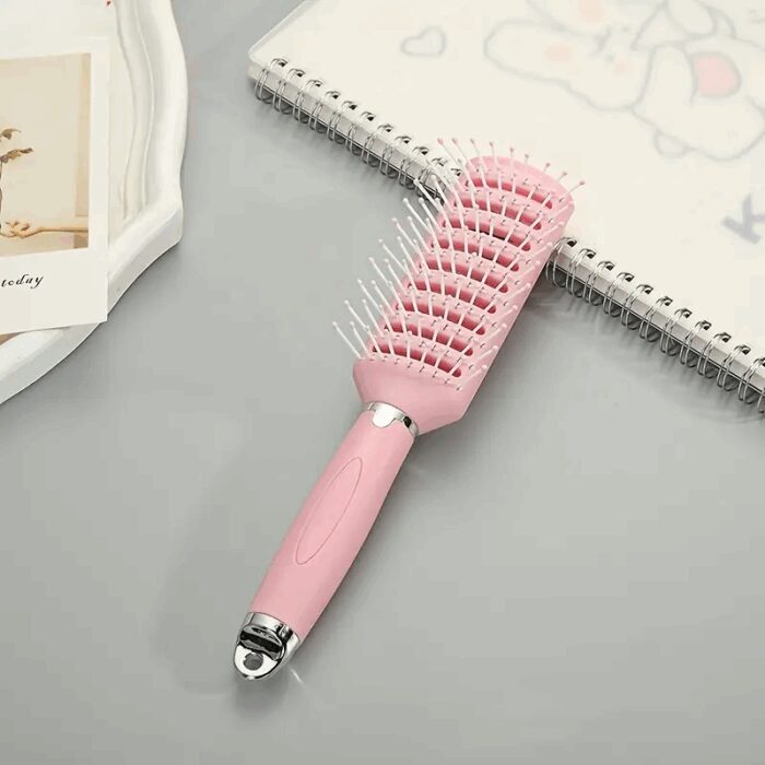 ⁦فرشاة شعر لون زهري⁩ - الصورة ⁦2⁩