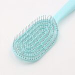 ⁦فرشاة شعر لون اخضر تركوازي⁩ - الصورة ⁦3⁩