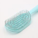 ⁦فرشاة شعر لون اخضر تركوازي⁩ - الصورة ⁦5⁩