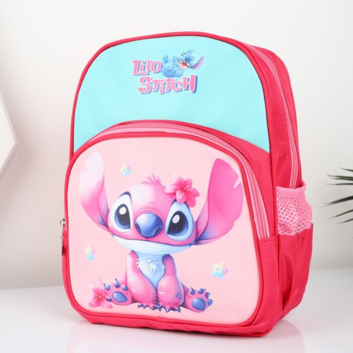 103387956_68a17a2cdc380 شنطة روضة بتصميم ستيتش مقاس 13 انش لون فوشي - الصورة 1