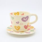 ⁦مج بورسلان مع صحن  بتصميم قلوب⁩ - الصورة ⁦2⁩