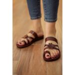 حفاية جلد طبيعي للنساء لون بني