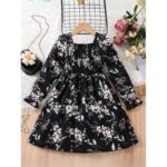 ⁦فستان بناتي لون اسود مع ورد⁩ - الصورة ⁦2⁩