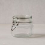 مرتبان زجاج غطاء كبس حجم 0.25 لتر