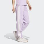 ⁦Adidas Womens' Essentials 3-Stripes French Terry Cuffed Joggers - Purple⁩ - الصورة ⁦4⁩