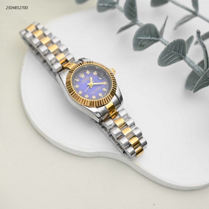 103391747_68e2e6270fa59 ساعة يد نسائية لون ذهبي وفضي - الصورة 1