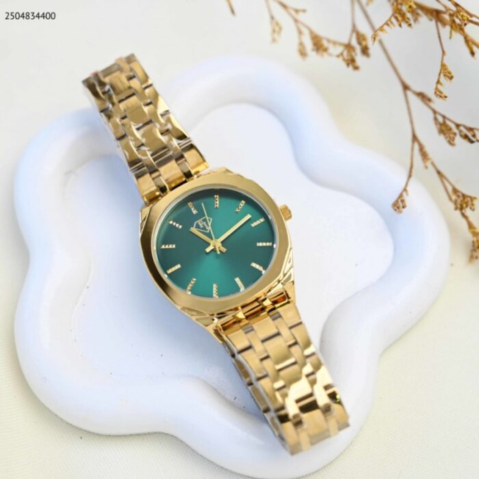 ⁦ساعة يد نسائية أنيقة لون ذهبي واخضر⁩ - الصورة ⁦1⁩