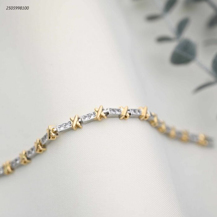 103391866_68e2e6b317f08 سوار ذهبي وفضي بتصميم X و زركون مستطيلة لون ذهبي وفضي - الصورة 1