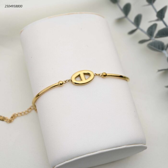 103391938_68e2e6db30937 سوار ماركة تتكون من وصلات على شكل نصف دائرة متصلة لون ذهبي - الصورة 1