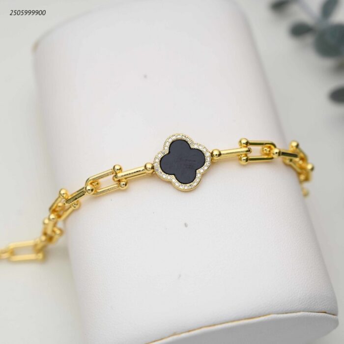 103392045_68e2e746dcaf6 سوار بسلسلة وتصميم زهرة البرسيم مرصعة بالزركون لون ذهب و اسود - الصورة 1