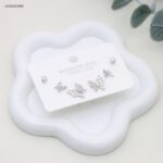 طقم حلوق مجموعة فراشات لون فضي