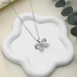 سلسال ببيونة مع ورق ارز لون فضي