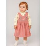 فستان لون زهري مع بلوزة بيضاء