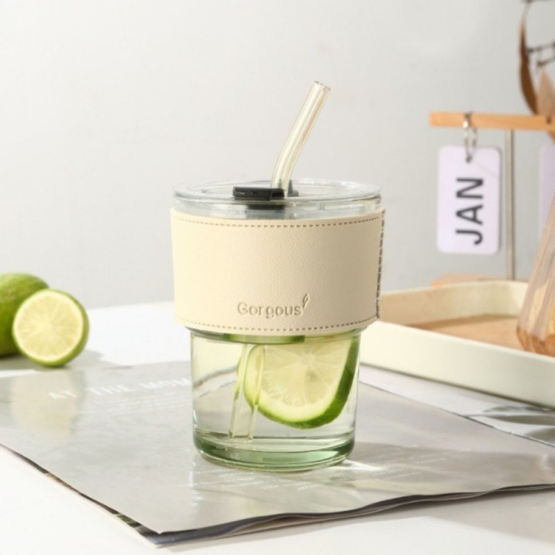 103394552_6970e5ad45f2c كاسة زجاج مع غطاء وجلدة ومصاصة لون شفاف أبيض - الصورة 1