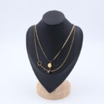 ⁦سلسال ذهبي طبقتين بتصميم دوائر ووردة⁩ - الصورة ⁦2⁩