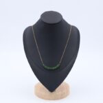 سلسال ذهبي مع زركون أخضر