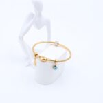 ⁦سوار لون ذهبي مع تفاصيل قلب وعين وكف⁩ - الصورة ⁦2⁩