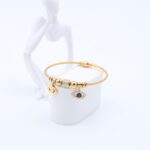 ⁦سوار لون ذهبي بتصميم عين من الزركون وكرات⁩ - الصورة ⁦3⁩