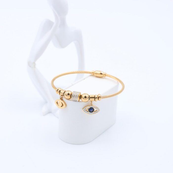 ⁦سوار لون ذهبي بتصميم عين من الزركون وكرات⁩ - الصورة ⁦3⁩