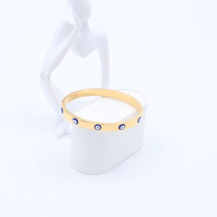 سوار رفيع لون ذهبي بتصميم عيون أزرق