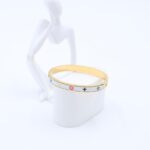 سوار لون ذهبي وأبيض