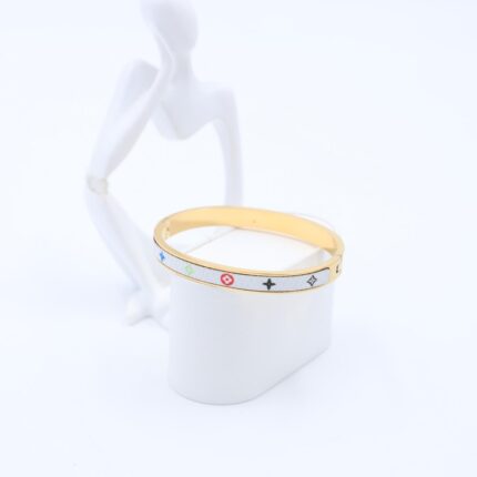 سوار لون ذهبي وأبيض