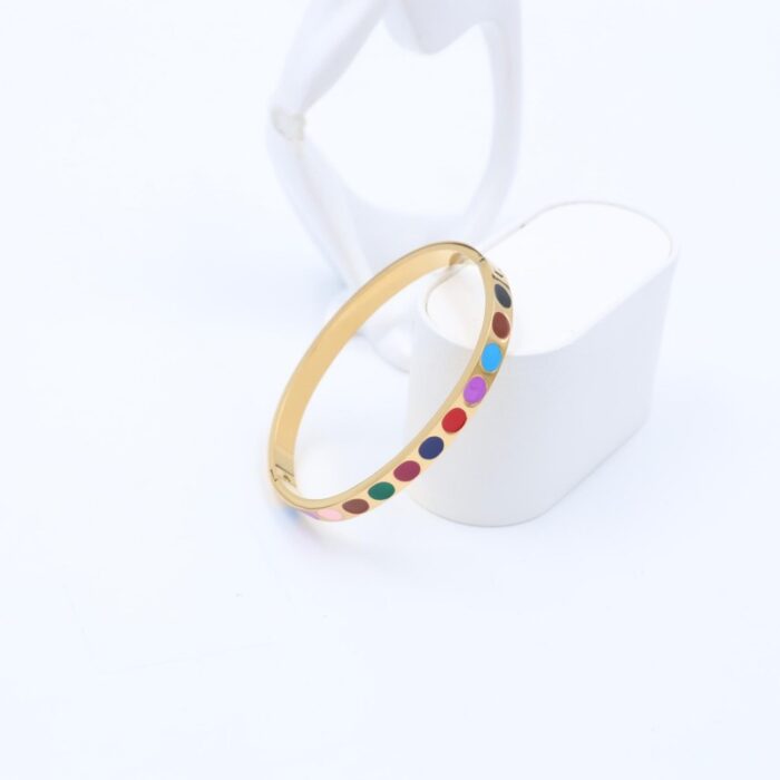 ⁦سوار لون ذهبي تصميم دوائر ملونة⁩ - الصورة ⁦2⁩