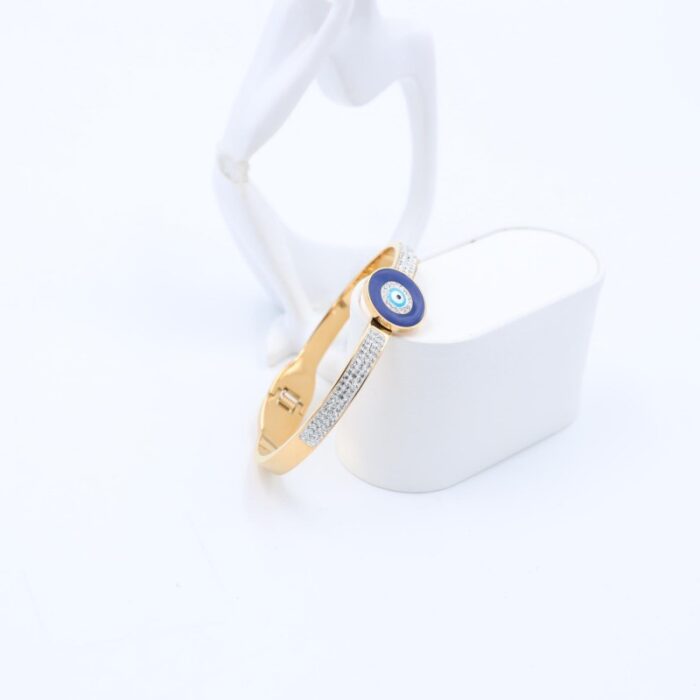 ⁦سوار لون ذهبي بتصميم عين مع زركون فضي⁩ - الصورة ⁦3⁩