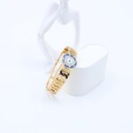 ⁦سوار لون ذهبي تصميم عين لون أزرق وزركون فضي⁩ - الصورة ⁦2⁩