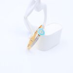 ⁦سوار لون ذهبي بتصميم عين لزن أزرق وزركون فضي⁩ - الصورة ⁦2⁩