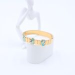 سوار لون ذهبي مع تصميم عين