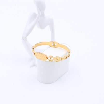 سوار لون ذهبي