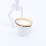 سوار لون ذهبي مع احجار زركون ملونة