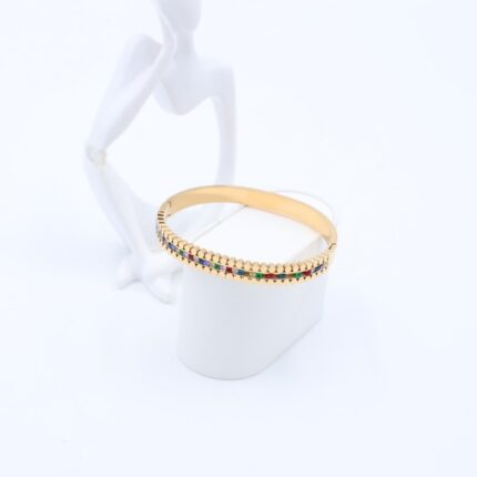 سوار لون ذهبي مع احجار زركون ملونة