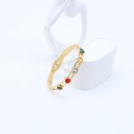 ⁦سوار لون ذهبي بتصميم دوائر زركون ملونة⁩ - الصورة ⁦2⁩