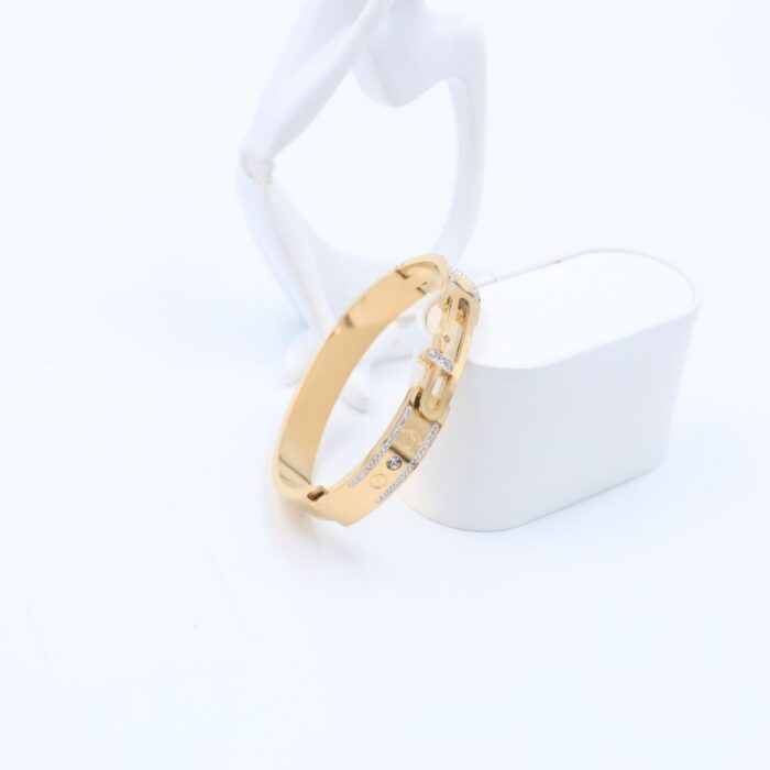 ⁦سوار لون ذهبي مع احجار زركون فضي⁩ - الصورة ⁦2⁩