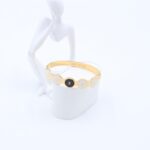 سوار لون ذهبي بتصميم دوائر أسود وأبيض