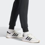⁦adidas Womens' Essentials Feel Cozy Track Suit - Black⁩ - الصورة ⁦8⁩