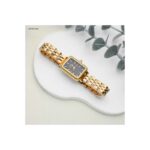 ساعة يد نسائية أنيقة اللون ذهب و اسود من ماركة FJ مع كفالة سنتين ضد تغير اللون