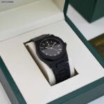 ساعة رجالي سداسية الشكل مع ذراع معدن اللون اسود من ماركة FJ مع كفالة سنتين ضد تغير اللون