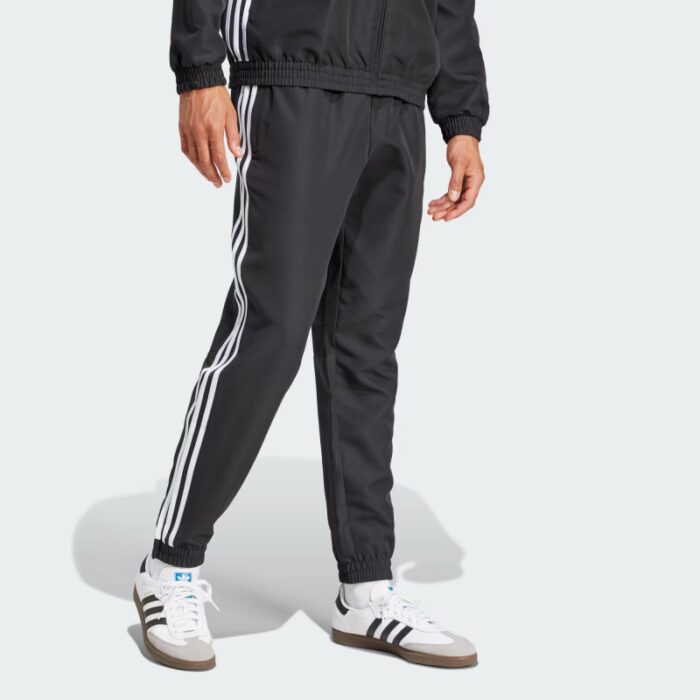 ⁦adidas Men's Tiro 25 Essentials Woven Tracksuit Bottoms- Black⁩ - الصورة ⁦3⁩