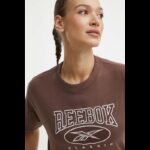 ⁦Reebok Women's Classics Archive Essentials Big Logo Crop- Brown⁩ - الصورة ⁦7⁩